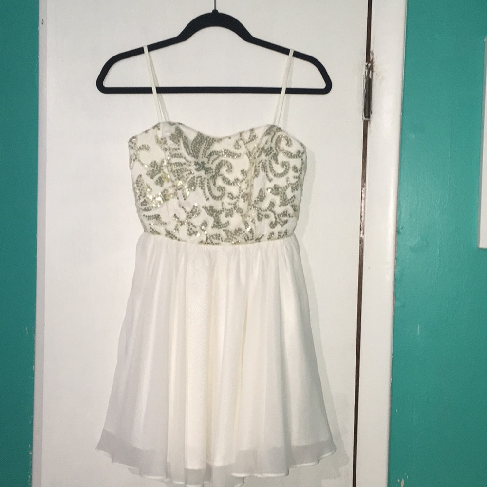 White and gold homecoming dress by GB.